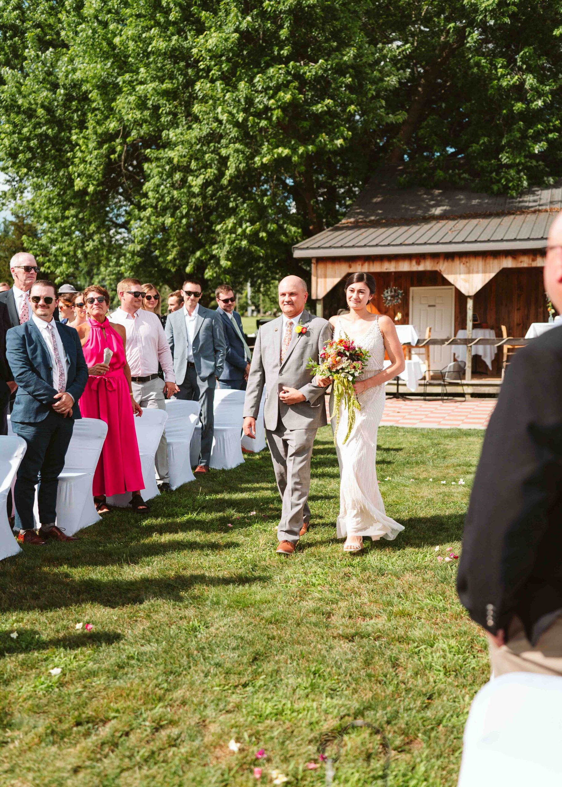 NH New England Rockingham Country Club wedding summer seacoast photographer  New Hampshire orange  wild flowers bride walking down the aisle with father