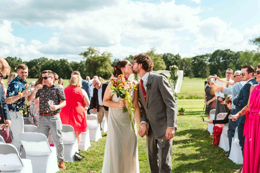 NH New England Rockingham Country Club wedding summer seacoast photographer  New Hampshire  ceremony fun walking down the aisle petal toss candid run exit dried flowers 