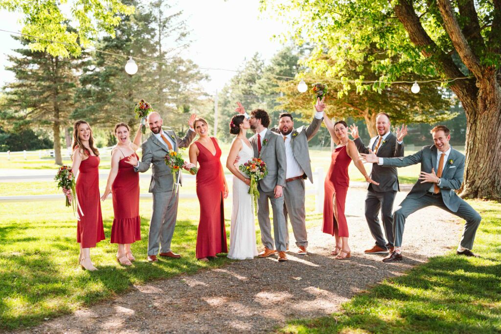 NH New England Rockingham Country Club wedding summer seacoast photographer  New Hampshire  group photo bridal party groomsmen grooms women bridesmaids brides gentlemen stringed light lanterns backlit fun crazy